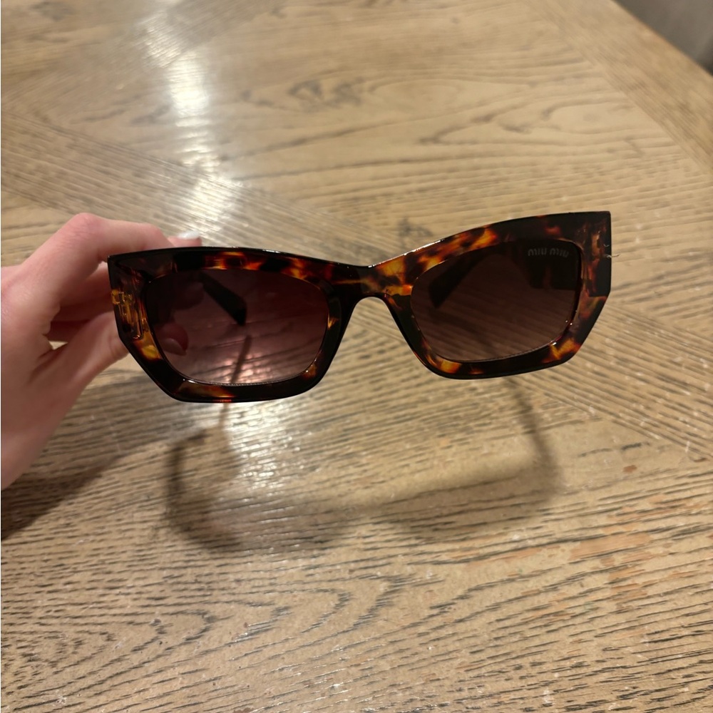 Miu miu Tortoise Shell Sunglasses